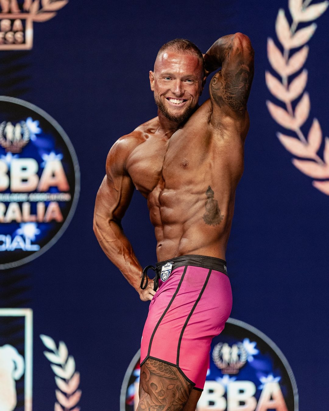 Grant Bourke posing at the NABBA Australia championships